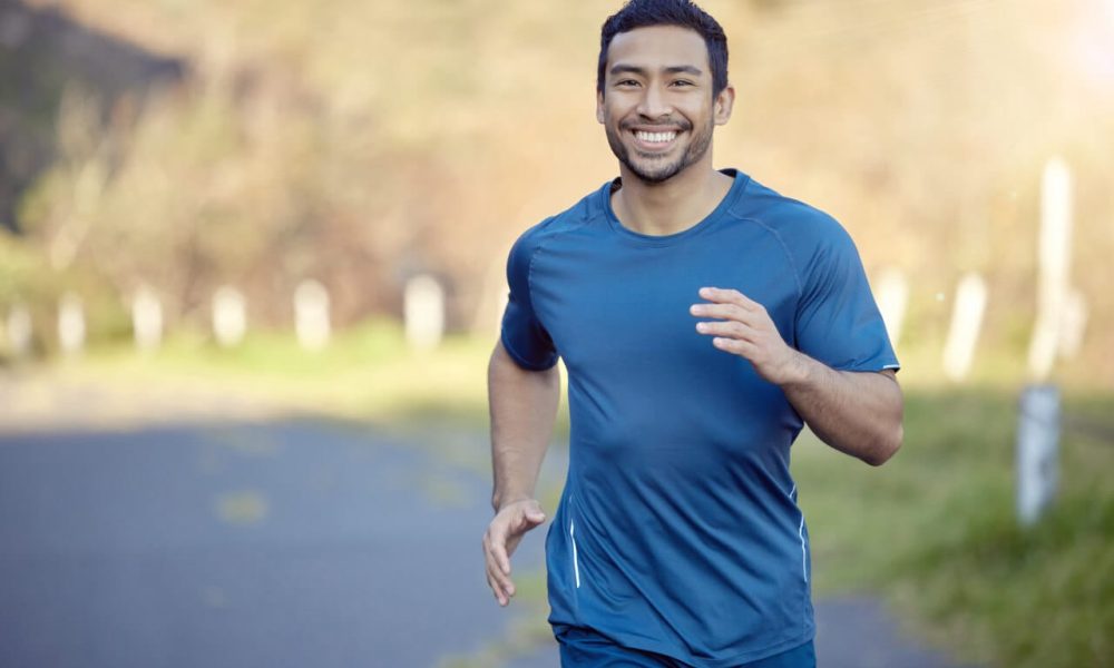 Ive always been one to chase my dreams. Shot of a handsome young man running alone outside during the day. | Imagine Medspa in Winter Garden, FL